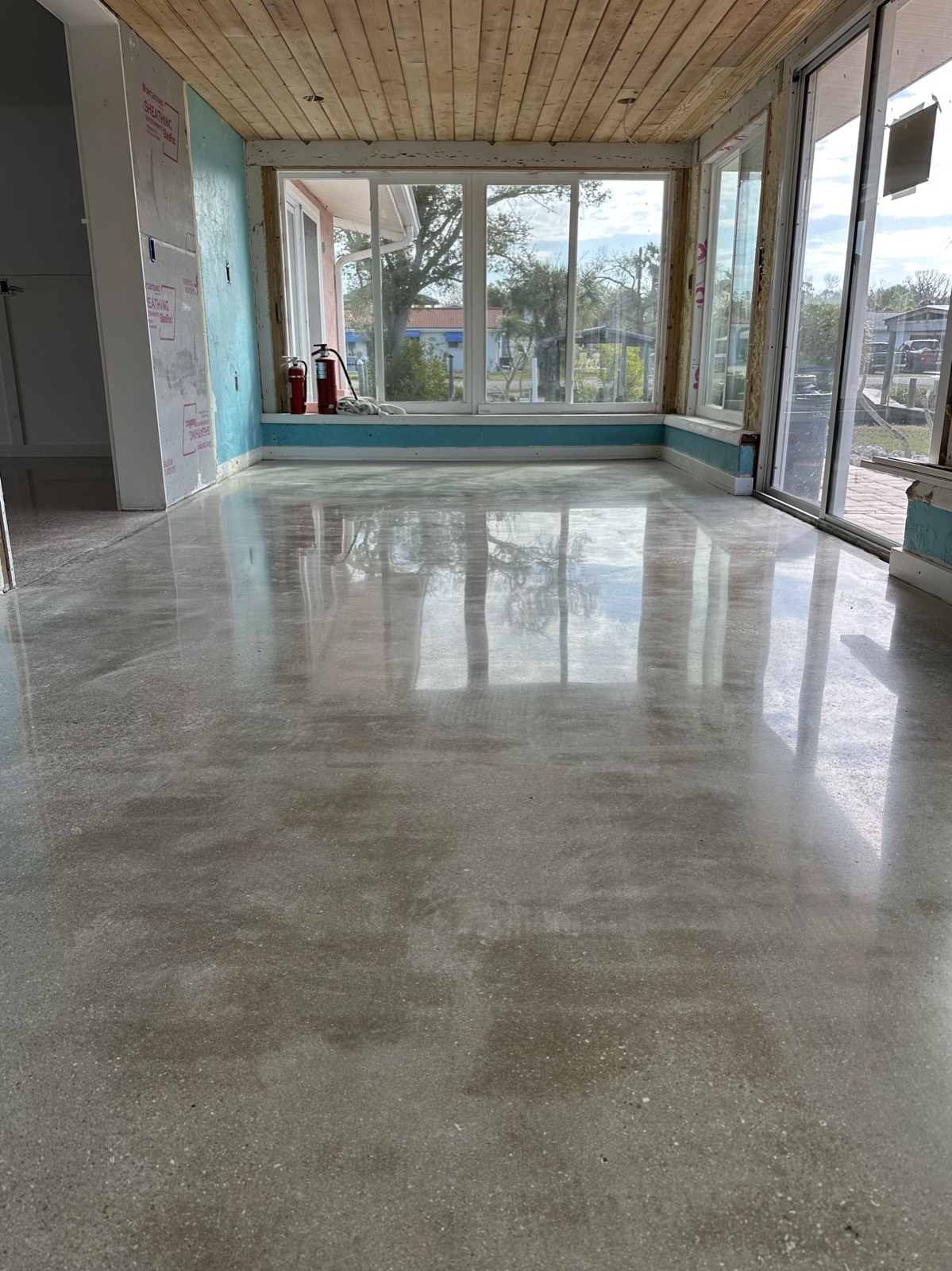 Polished concrete in a lanai in a home.