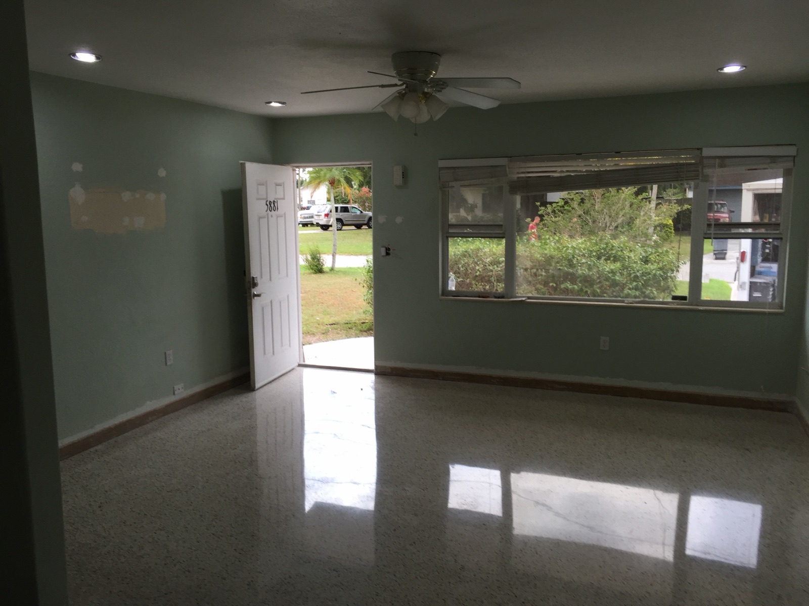 Restored terrazzo living room in Kenneth City, Saint Petersburg