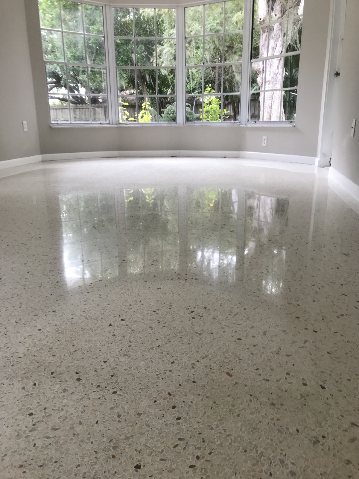 Reflection of large windows in terrazzo in Gulf Gate, Sarasota