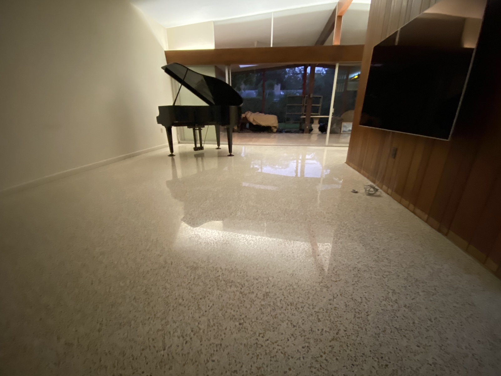 Polished terrazzo with a grand piano on it